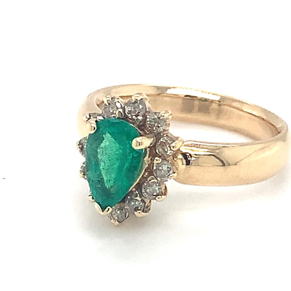 Pear Emerald with Twelve Round Diamonds Estate Ring in 14-Karat Yellow Gold
